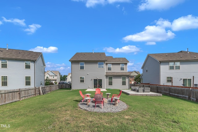 525 Willow Breeze Ct, Zebulon, NC 27597 - back of house featuring a fenced backyard, a patio area, a residential view, and an outdoor living space with a fire pit