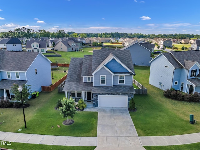 525 Willow Breeze Ct, Zebulon, NC 27597 - view of front of property featuring a residential view, a garage, concrete driveway, and a front yard