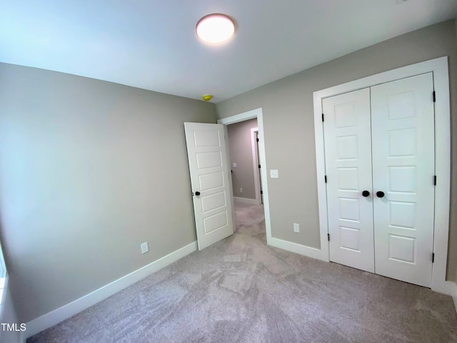 608 E Umstead St, Durham, NC 27701 - unfurnished bedroom with carpet and a closet