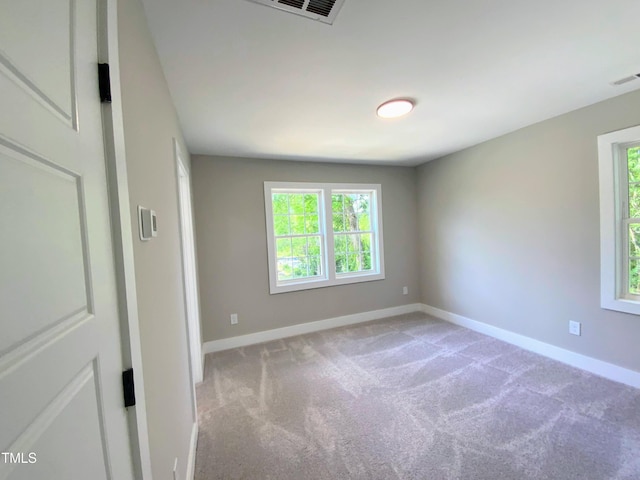608 E Umstead St, Durham, NC 27701 - carpeted spare room with healthy amount of natural light
