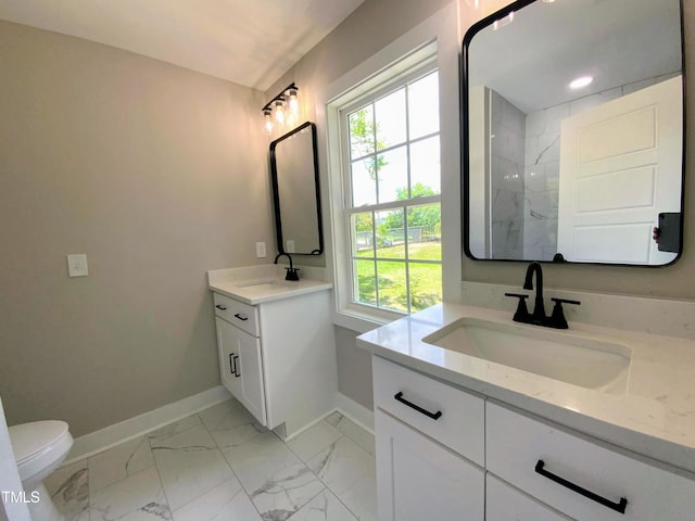 608 E Umstead St, Durham, NC 27701 - full bathroom with two vanities and marble finish flooring