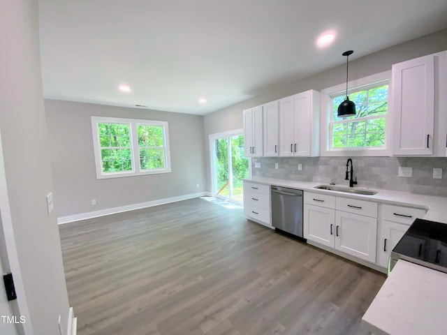 608 E Umstead St, Durham, NC 27701 - kitchen featuring stainless steel appliances, decorative backsplash, decorative light fixtures, white cabinets, and recessed lighting