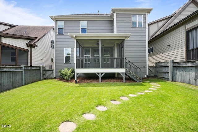 1962 Briar Chapel Pkwy, Chapel Hill, NC 27516 - back of property featuring a sunroom, a fenced backyard, a gate, and a ceiling fan