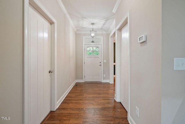 1962 Briar Chapel Pkwy, Chapel Hill, NC 27516 - entryway featuring dark wood-style flooring and ornamental molding