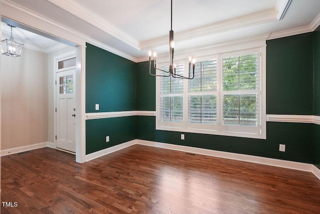 1962 Briar Chapel Pkwy, Chapel Hill, NC 27516 - unfurnished dining area with a chandelier, wood finished floors, and crown molding