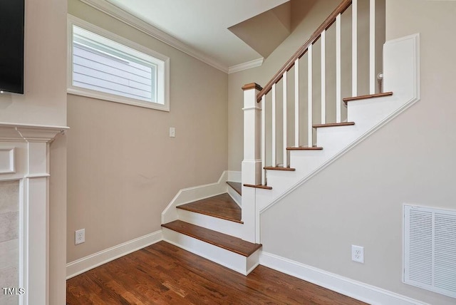 1962 Briar Chapel Pkwy, Chapel Hill, NC 27516 - stairs featuring wood finished floors and crown molding