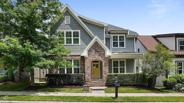 1962 Briar Chapel Pkwy, Chapel Hill, NC 27516 - view of front of house with brick siding and roof with shingles