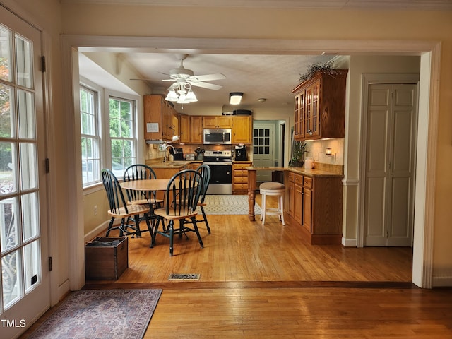 5760 Hesters Store Rd, Hurdle Mills, NC 27541 - dining space with light wood-style floors and a ceiling fan