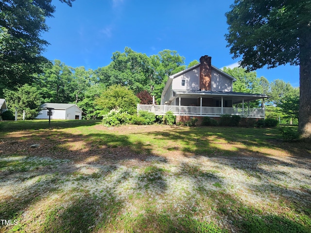 5760 Hesters Store Rd, Hurdle Mills, NC 27541 - view of grassy yard with covered porch