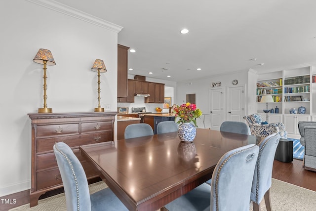 9302 Nellman Ln, Raleigh, NC 27617 - dining area with light wood-style floors, recessed lighting, crown molding, and built in shelves