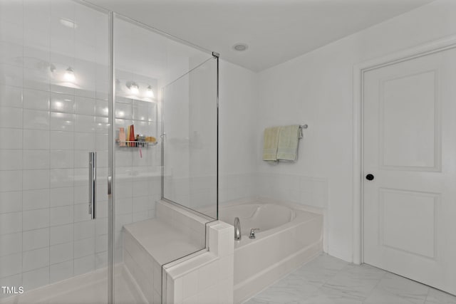 9302 Nellman Ln, Raleigh, NC 27617 - full bath with a garden tub, a shower stall, and marble look tile flooring