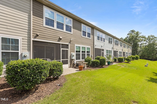 9302 Nellman Ln, Raleigh, NC 27617 - rear view of property featuring a yard