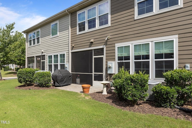 9302 Nellman Ln, Raleigh, NC 27617 - rear view of property featuring a lawn