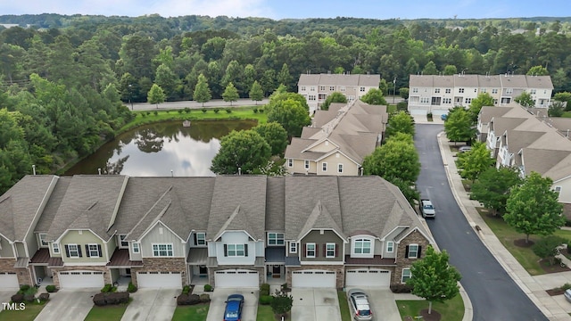 9302 Nellman Ln, Raleigh, NC 27617 - aerial perspective of suburban area with a large body of water and a forest