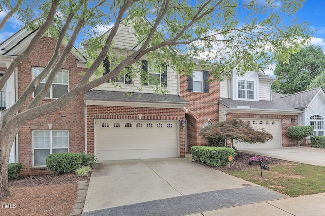 12227 Orchardgrass Ln, Raleigh, NC 27614 - view of front of property with driveway, an attached garage, brick siding, and a shingled roof