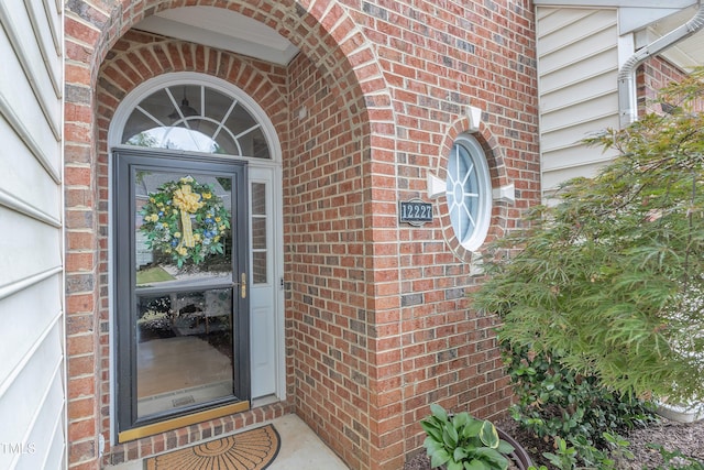 12227 Orchardgrass Ln, Raleigh, NC 27614 - doorway to property with brick siding