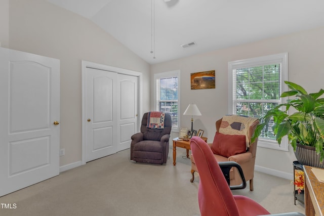12227 Orchardgrass Ln, Raleigh, NC 27614 - living area featuring vaulted ceiling and carpet