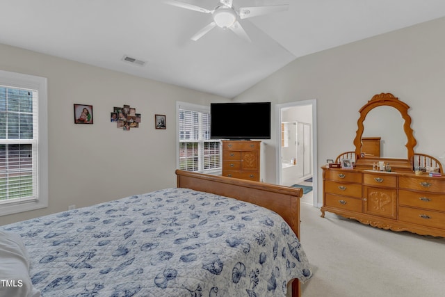 12227 Orchardgrass Ln, Raleigh, NC 27614 - bedroom with light colored carpet, vaulted ceiling, a ceiling fan, and connected bathroom