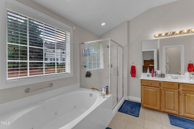 12227 Orchardgrass Ln, Raleigh, NC 27614 - full bathroom featuring a stall shower, vanity, a tub with jets, healthy amount of natural light, and vaulted ceiling