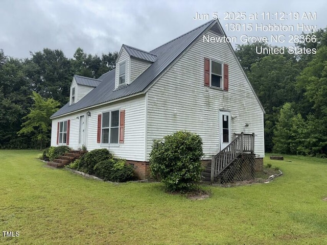 13015 Hobbton Hwy, Newton Grove, NC 28366 - view of property exterior featuring a yard