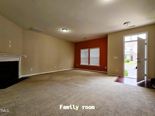 711 Keystone Park Dr Unit 78, Morrisville, NC 27560 - unfurnished living room with carpet flooring and a fireplace with flush hearth