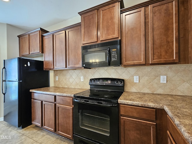 711 Keystone Park Dr Unit 78, Morrisville, NC 27560 - kitchen featuring black appliances, backsplash, and light countertops