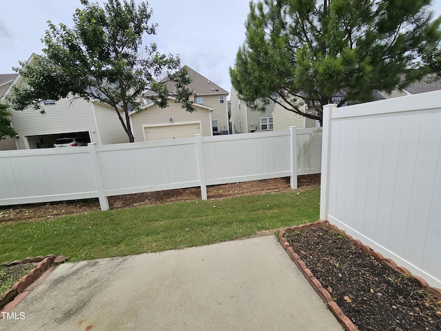 711 Keystone Park Dr Unit 78, Morrisville, NC 27560 - view of yard with a garage