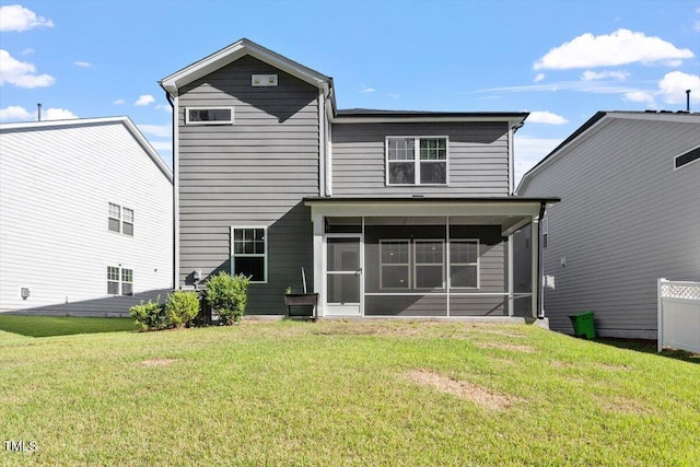 4940 Enlightenment Rd, Raleigh, NC 27616 - back of property featuring a sunroom and a lawn