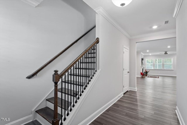 4940 Enlightenment Rd, Raleigh, NC 27616 - stairs featuring wood finished floors, crown molding, a ceiling fan, and recessed lighting