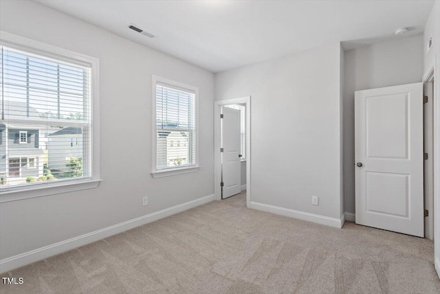 4940 Enlightenment Rd, Raleigh, NC 27616 - unfurnished bedroom with carpet floors and baseboards