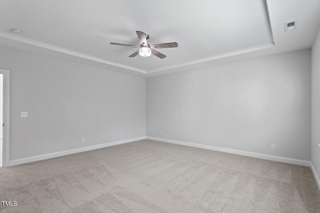 4940 Enlightenment Rd, Raleigh, NC 27616 - carpeted spare room featuring a ceiling fan, a raised ceiling, and crown molding