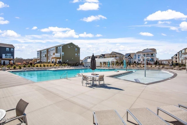 4940 Enlightenment Rd, Raleigh, NC 27616 - community pool with a patio and a residential view