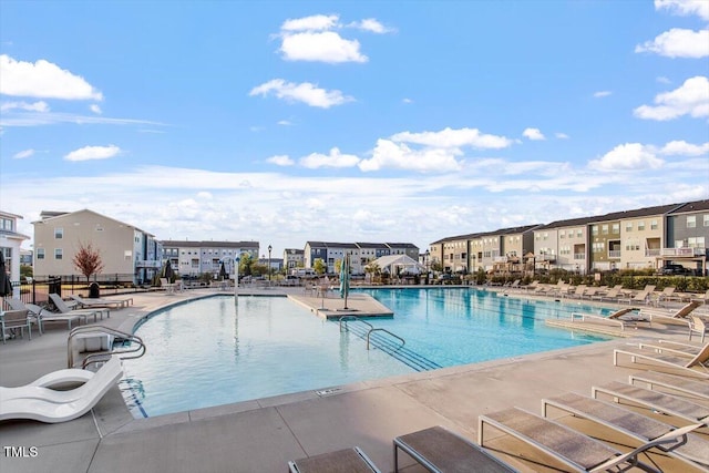 4940 Enlightenment Rd, Raleigh, NC 27616 - community pool with a residential view and a patio