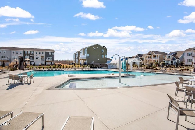 4940 Enlightenment Rd, Raleigh, NC 27616 - community pool with a patio and a residential view