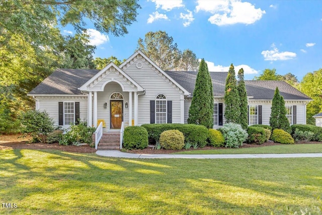 1819 Umstead Rd, Durham, NC 27712 - view of front of house with a front lawn