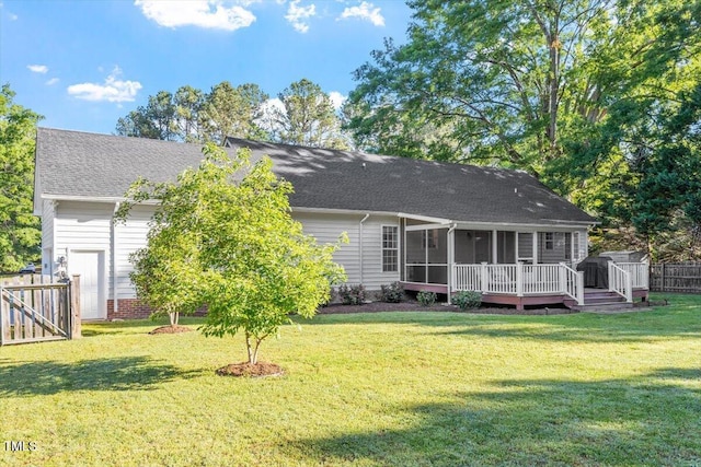 1819 Umstead Rd, Durham, NC 27712 - rear view of property featuring a sunroom, a deck, and a shingled roof