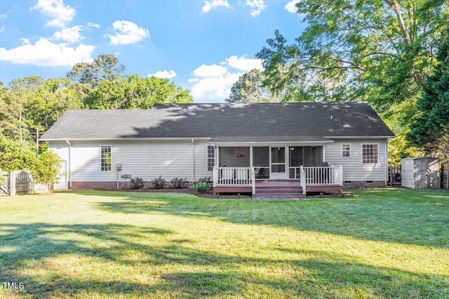 1819 Umstead Rd, Durham, NC 27712 - back of house with a sunroom, crawl space, a shed, and a shingled roof