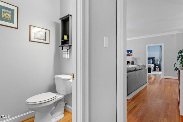 1819 Umstead Rd, Durham, NC 27712 - bathroom featuring crown molding and wood finished floors