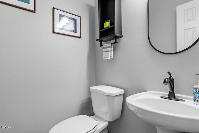 1819 Umstead Rd, Durham, NC 27712 - bathroom featuring a sink and toilet