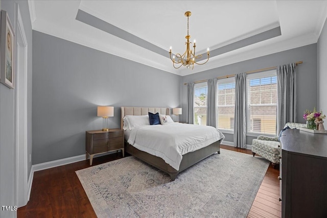 1330 Rodessa, Raleigh, NC 27607 - bedroom featuring a raised ceiling, a chandelier, wood-type flooring, and crown molding