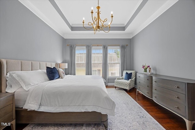 1330 Rodessa, Raleigh, NC 27607 - bedroom featuring a chandelier, dark wood-style flooring, a tray ceiling, and ornamental molding