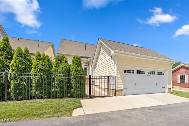 1330 Rodessa, Raleigh, NC 27607 - view of property exterior with a garage and driveway