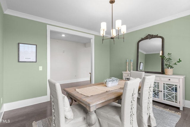 10310 Sablewood Dr Unit 211, Raleigh, NC 27617 - dining area with wood finished floors, crown molding, and a chandelier