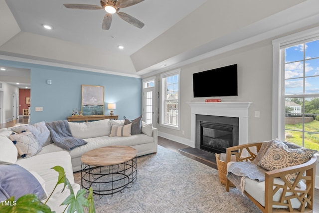 10310 Sablewood Dr Unit 211, Raleigh, NC 27617 - living room with a fireplace with flush hearth, ceiling fan, wood finished floors, recessed lighting, and a raised ceiling