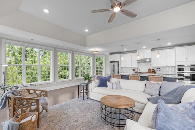 10310 Sablewood Dr Unit 211, Raleigh, NC 27617 - living room with wood finished floors, ceiling fan, and recessed lighting