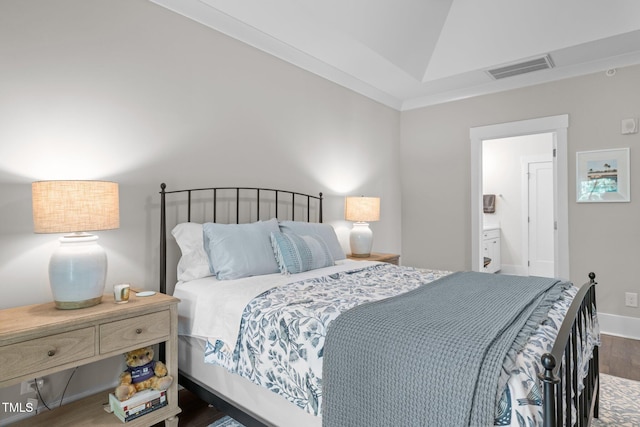 10310 Sablewood Dr Unit 211, Raleigh, NC 27617 - bedroom with wood finished floors and ensuite bathroom