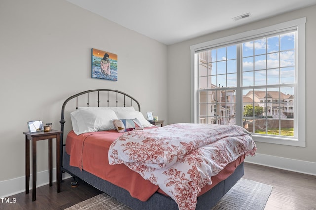 10310 Sablewood Dr Unit 211, Raleigh, NC 27617 - bedroom with wood finished floors and baseboards