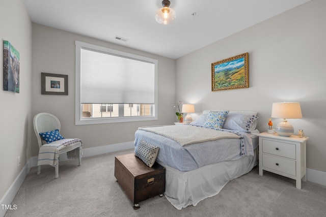 10310 Sablewood Dr Unit 211, Raleigh, NC 27617 - carpeted bedroom featuring baseboards