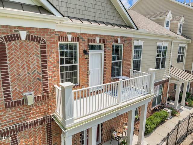 10310 Sablewood Dr Unit 211, Raleigh, NC 27617 - entrance to property featuring a balcony and brick siding