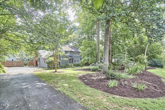 2334 Dawn Trl, Durham, NC 27712 - view of front facade featuring asphalt driveway